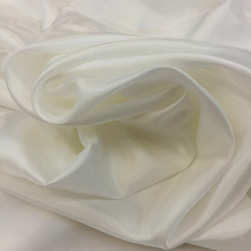 Переливающаяся подкладочная ткань чисто-белого цвета 