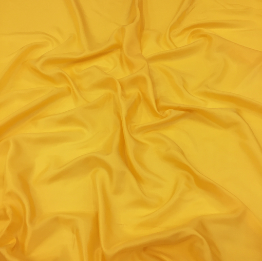 Вискозная подкладочная ткань яркого желтого цвета