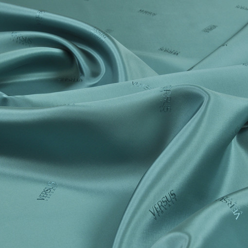 Жаккардовая подкладочная ткань нежного изумрудного цвета Versus Versace