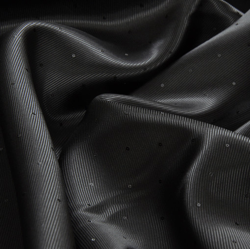 Вискозная подкладочная ткань угольного цвета с диагональной фактурой и горошинами