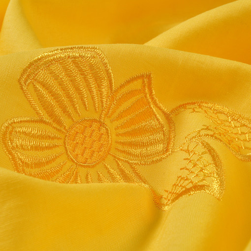 Вышитый хлопок желтого цвета с цветами