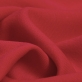 Костюмная шерстяная ткань алого цвета крепового плетения