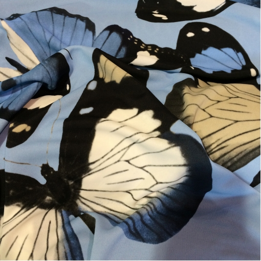 Трикотаж вискозный скользкий принт голубые бабочки