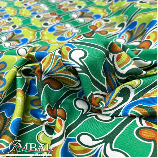 Ткань плательная хлопок с вискозой стилизованные цветы на зеленом фоне