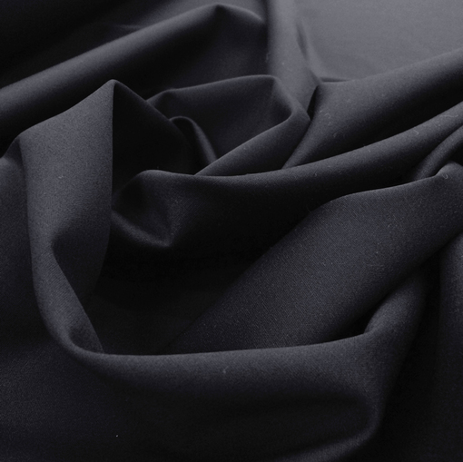 Ткань костюмная шерстяная стрейч черно-синего цвета с отливом
