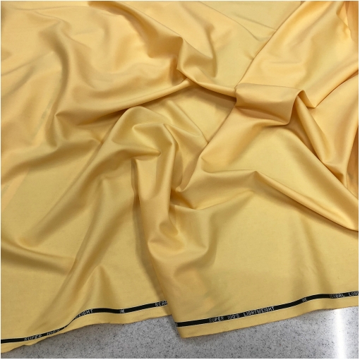 Ткань костюмная шерстяная стрейч супер 100s разбеленого желтого цвета