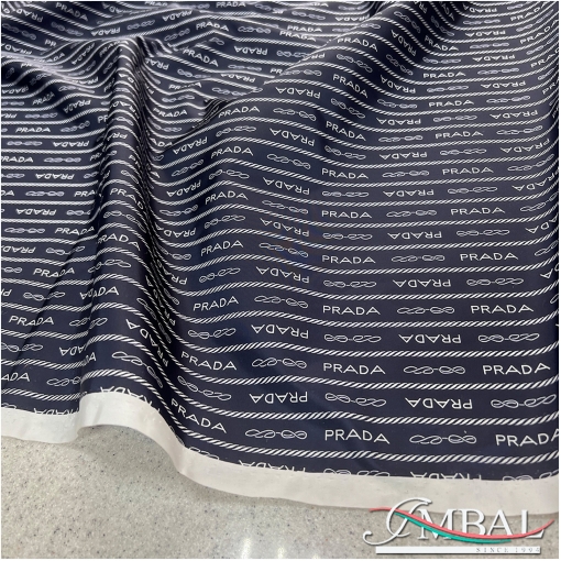 Ткань плащево-курточная дизайн PRADA логотипы и полосы на темно-синем фоне