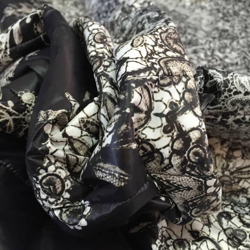Курточная ткань Elisa Fanti стеганая купон принт в черно-бежевых тонах