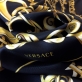 Шелк атлас купон Versace черный с золотыми вензелями