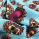 Шелк креповый принт D&G сердечки-кулоны на голубом фоне